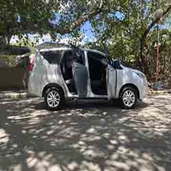 2019 silver toyota innova right side open doors.