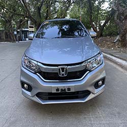2020 silver honda city car for hire front view