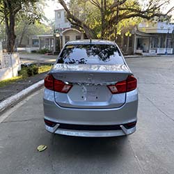 2020 silver honda city car for hire rear view