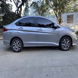 2020 silver honda city car for hire right view