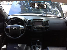 black SUV toyota fortuner 2105 dashboard view