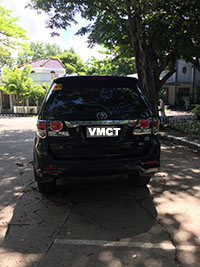 black SUV toyota fortuner 2105 rear view