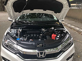 honda city car for rent in manila engine view
