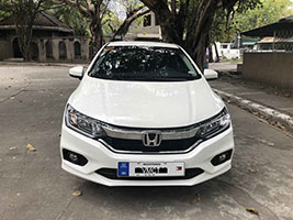 honda city car for rent in manila front view