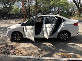 honda city car for rent in manila left side doors open