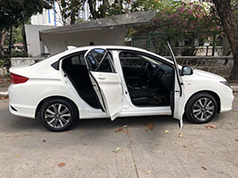 honda city car for rent in manila right side doors open